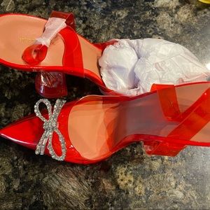 Red diamanté bow clear straps